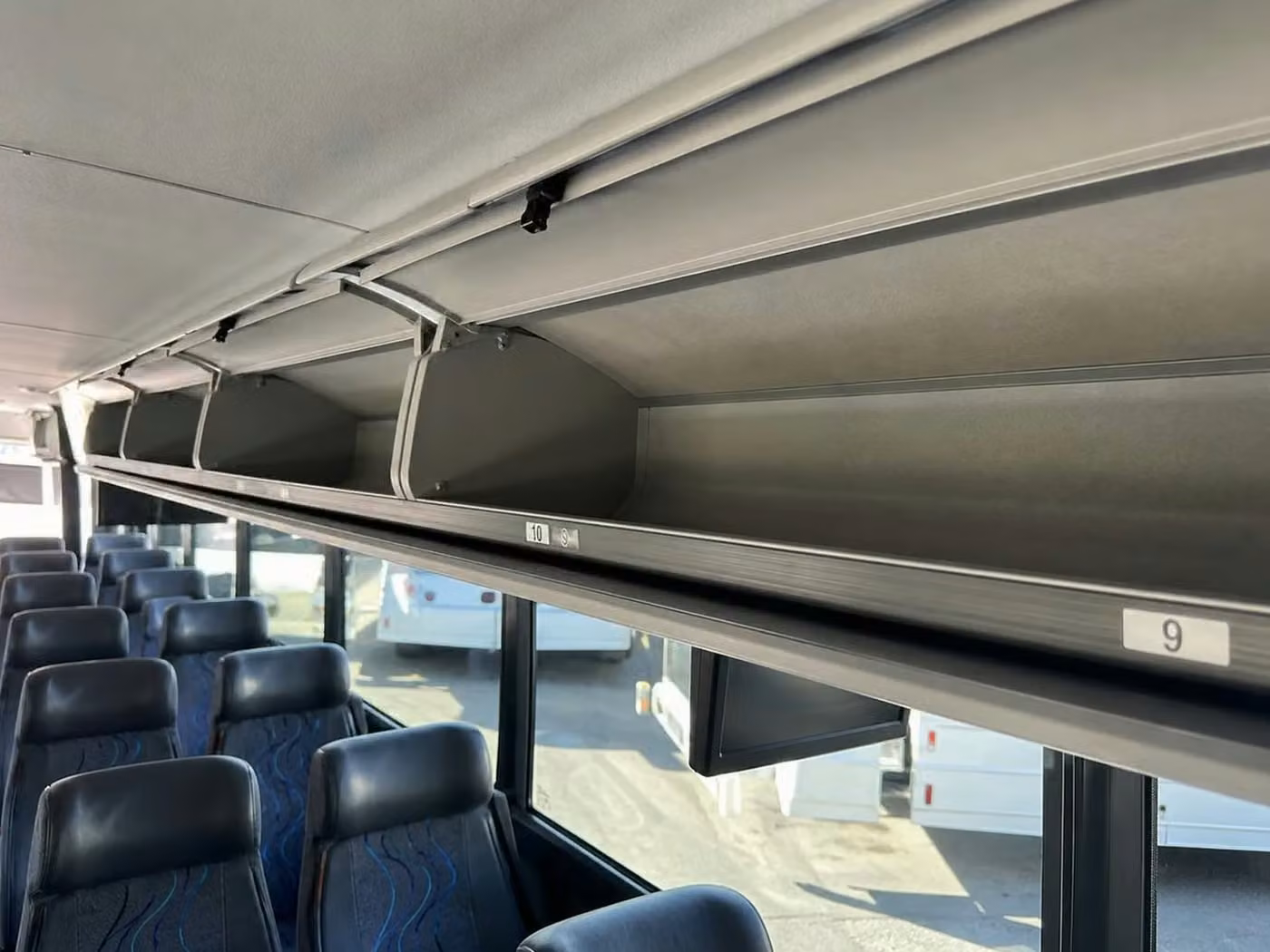 miami lakes 56 passenger charter bus overhead storage